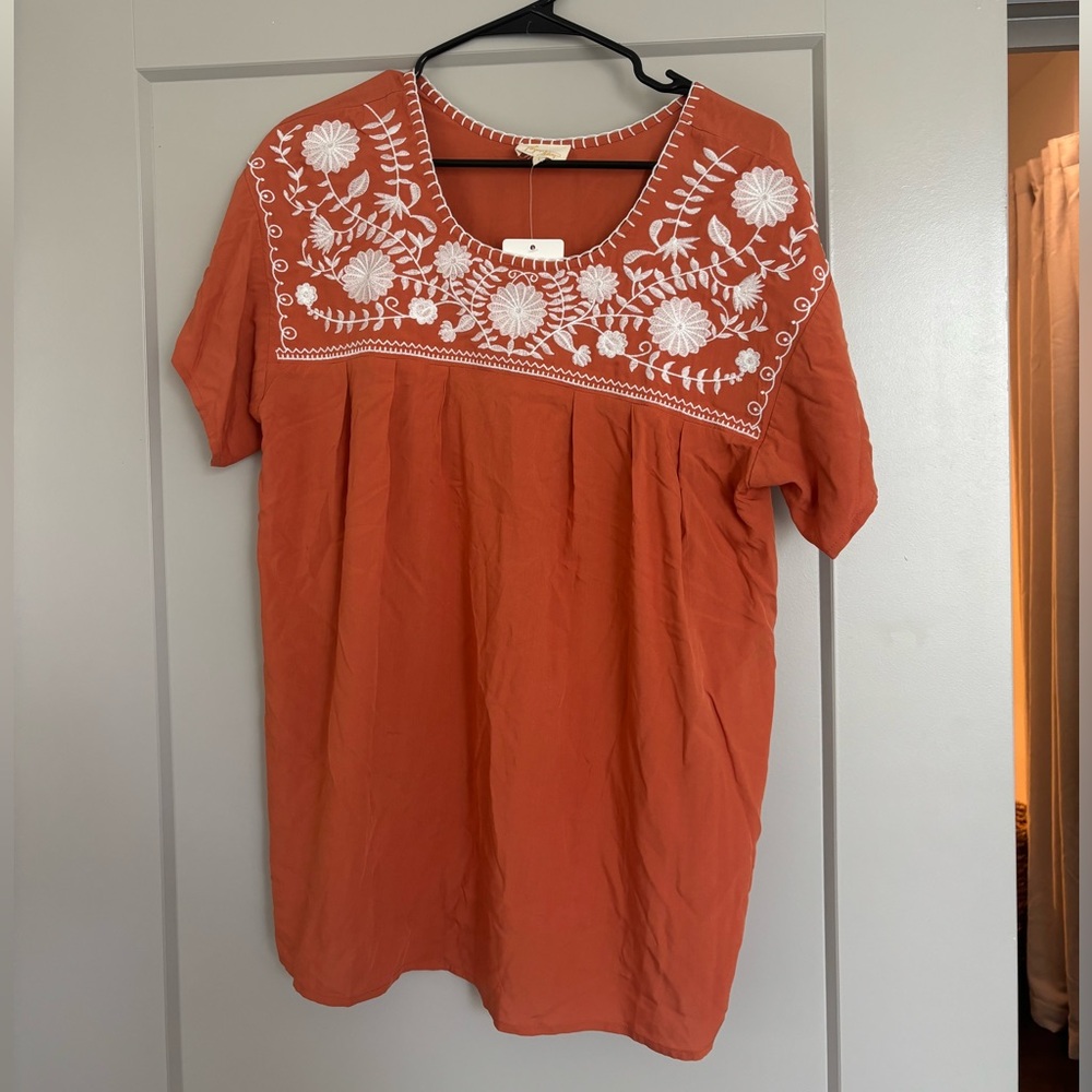 Burnt orange and white blouse